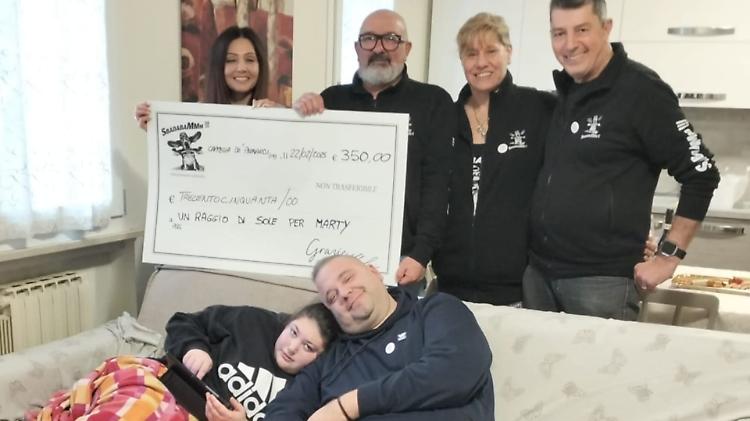 Solidarietà: un bel sorriso per Marty e la mamma